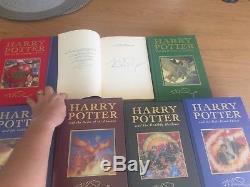 Complete set of First edition Harry Potter Books with the first 3 signed