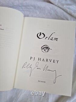Signed copy of P. J Harvey's blue hardback poem book, Orlam